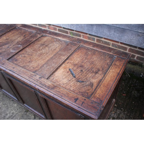 500 - An 18th century oak four panel coffer, 56