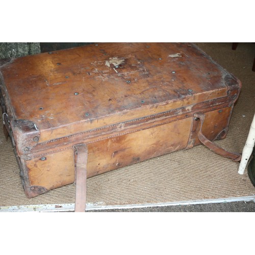 592 - A leather bound trunk, 36