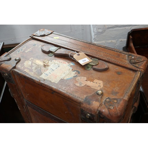 592 - A leather bound trunk, 36