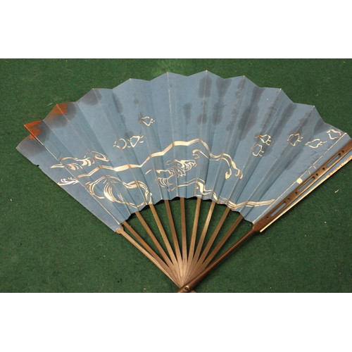 112 - Fifteen Japanese fans, some with calligraphy decoration, various