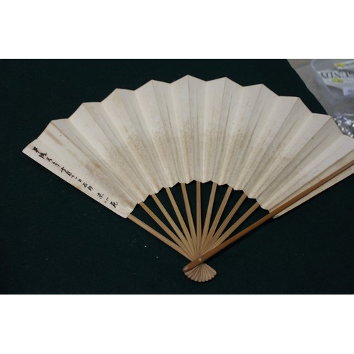 112 - Fifteen Japanese fans, some with calligraphy decoration, various