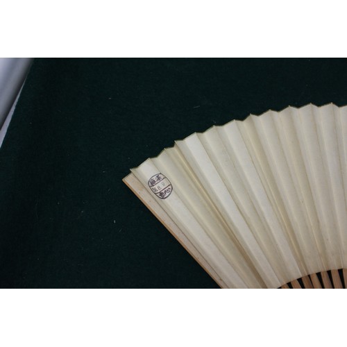 112 - Fifteen Japanese fans, some with calligraphy decoration, various