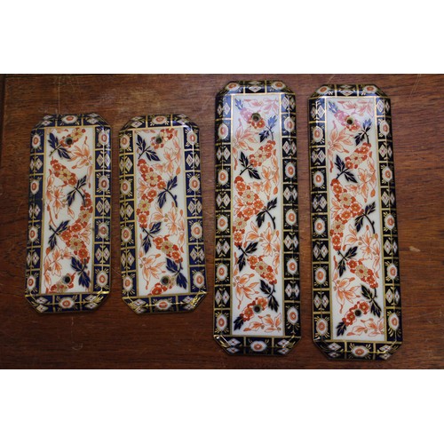 74 - Two pairs of Imari pattern door plates, two similar key plates, two similar handles, other various h... 