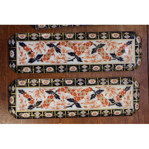 74 - Two pairs of Imari pattern door plates, two similar key plates, two similar handles, other various h... 