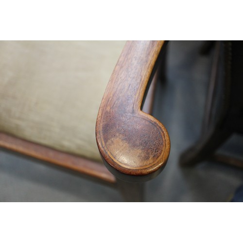 483 - An Edwardian walnut and line inlaid elbow chair with drop-in seat, on square taper supports