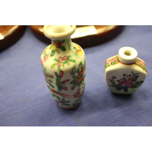 103 - Two Chinese blue and white tea bowls with panelled floral decoration and four-character, double ring... 