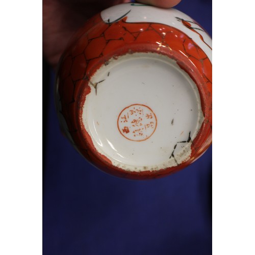 103 - Two Chinese blue and white tea bowls with panelled floral decoration and four-character, double ring... 