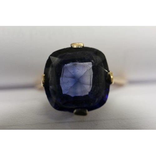 312 - A 9ct gold Ceylon sapphire solitaire ring, stone 10.4mm x 10.76mm x 6mm deep, size S