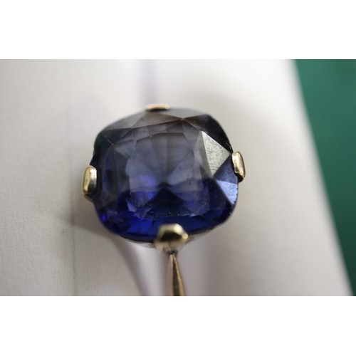 312 - A 9ct gold Ceylon sapphire solitaire ring, stone 10.4mm x 10.76mm x 6mm deep, size S