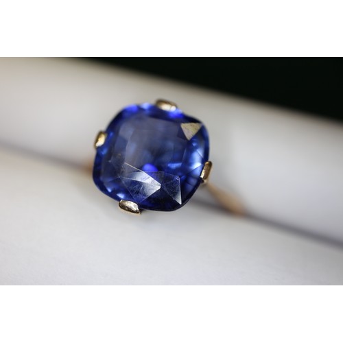 312 - A 9ct gold Ceylon sapphire solitaire ring, stone 10.4mm x 10.76mm x 6mm deep, size S