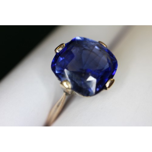 312 - A 9ct gold Ceylon sapphire solitaire ring, stone 10.4mm x 10.76mm x 6mm deep, size S