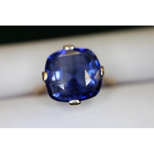 312 - A 9ct gold Ceylon sapphire solitaire ring, stone 10.4mm x 10.76mm x 6mm deep, size S