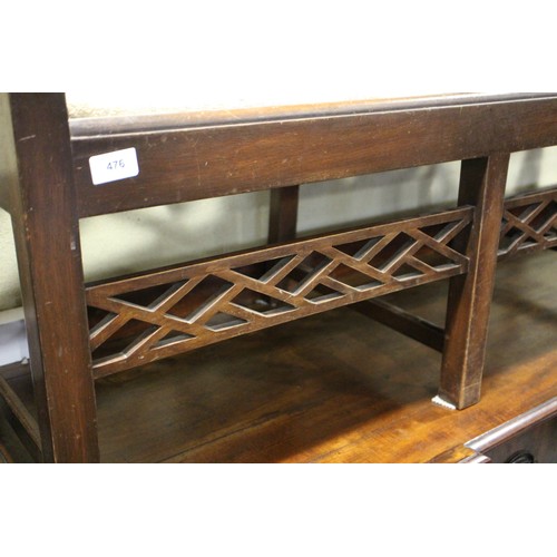 476 - A mahogany chair back settee of Chinese Chippendale design with drop in seat, on stretchered support... 