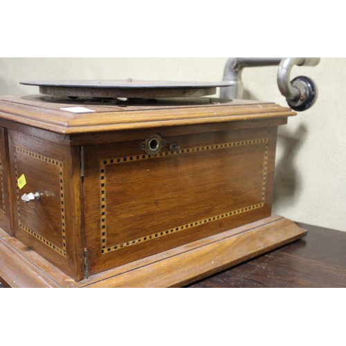 130 - An early 20th century oak cased record player