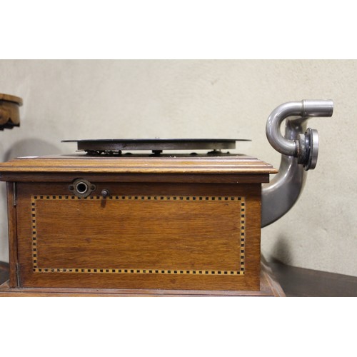 130 - An early 20th century oak cased record player