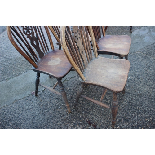 456 - A Harlequin set of four 19th century Windsor wheelback chairs with elm panel seats (3+1), a 19th cen... 