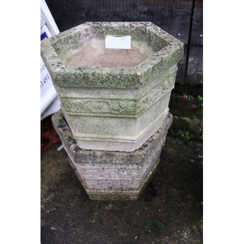 593 - A pair of cast stone square planters, 11