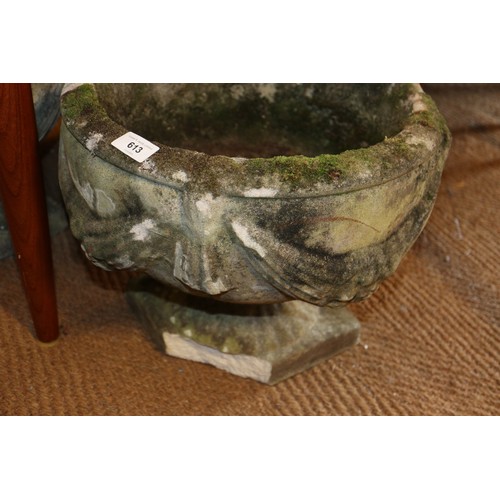 591 - A set of four cast stone planters with swag decoration, 15