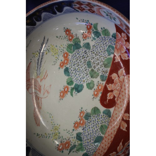 107 - A Chinese Imari pattern bowl with bird and floral decoration, 12 1/3