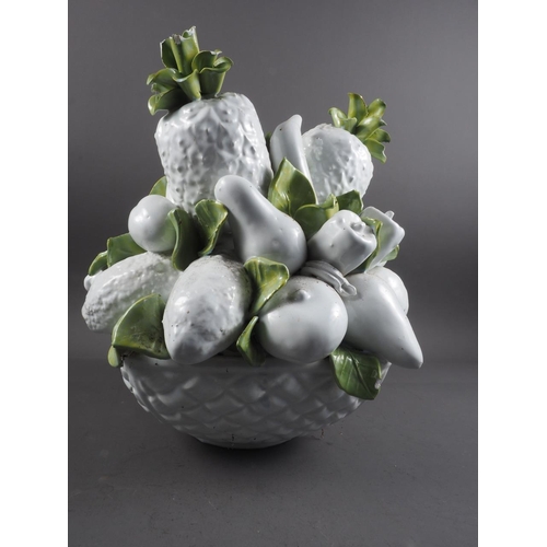 12 - A ceramic table centre, formed as a basket of fruit, 15