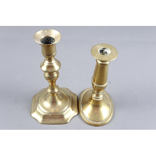 150 - An early Georgian brass candlestick, on shaped base, 7