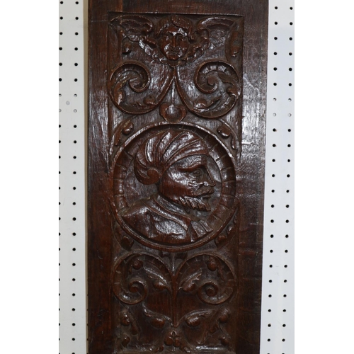 181 - A pair of 16th century French? carved oak portrait panels with scroll work, 19