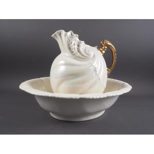 22 - A pearlescent shell-shaped toilet jug and bowl (chips)