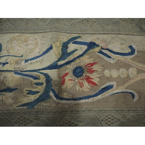 251 - A runner made of a fragment of 18th century Beauvais tapestry with later metal thread edging, 11