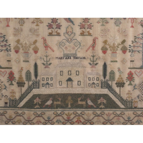 254 - An early 19th century sampler with buildings, birds and trees, worked by Mary Ann Taylor, 12