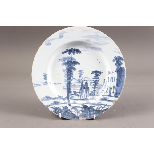 27 - An 18th century Bristol delft plate with landscape and figure decoration, 9