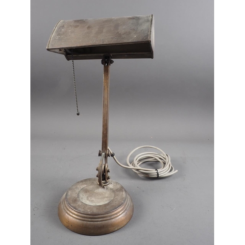 281 - A brass adjustable desk lamp