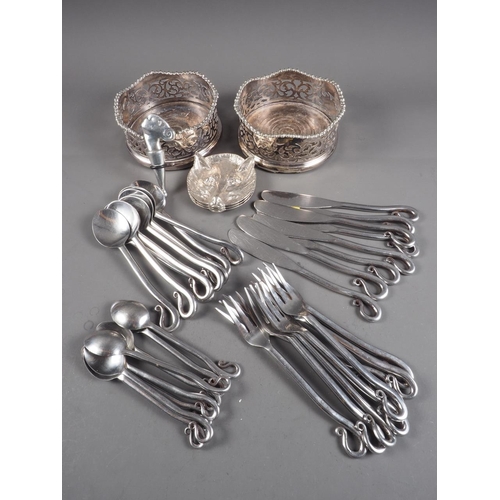 295 - A pair of silver plated two-branch candelabra, a pair of magnum sized plated bottle coasters, three ... 