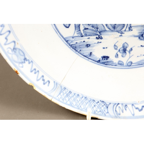 32 - An 18th century Bristol? delft shallow bowl with Chinese figure decoration, 10