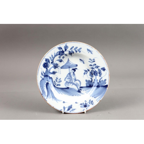 33 - An 18th century Liverpool delft plate with seated Chinese figure decoration, 8 3/4