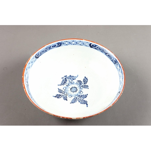 35 - An 18th century Liverpool? delft bowl with fluted decoration and 