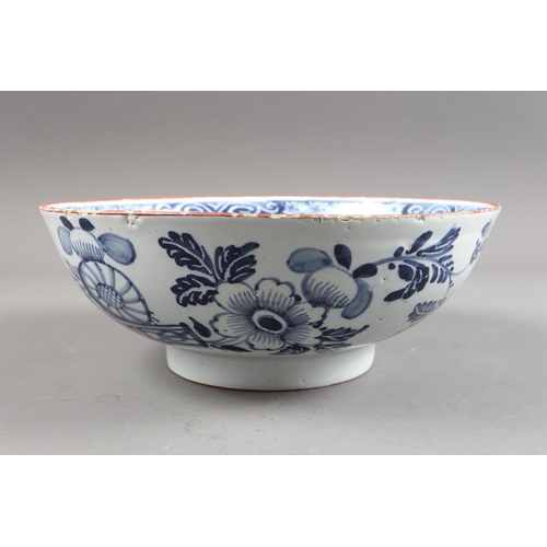 35 - An 18th century Liverpool? delft bowl with fluted decoration and 