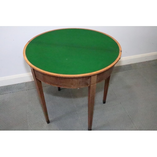 433 - A Georgian mahogany and banded semi-circular fold-over top card table, 30