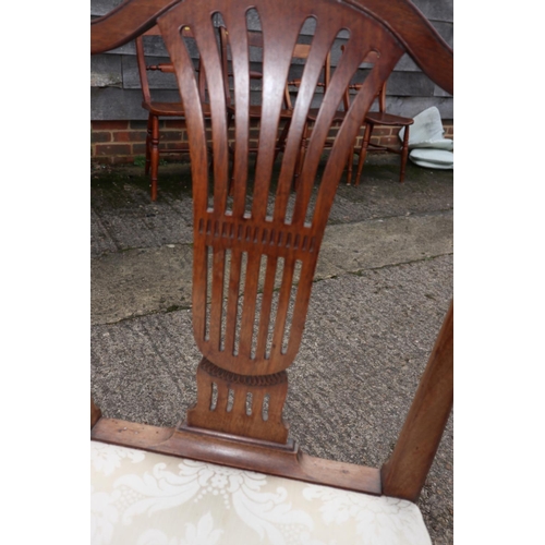 436 - A set of eight Hepplewhite Revival mahogany dining chairs with pierced and carved splats and stuffed... 