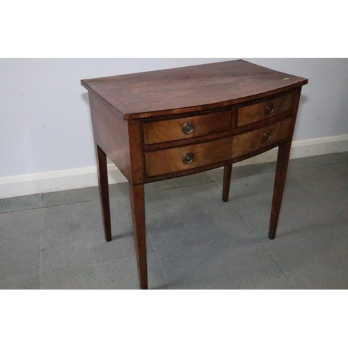 438 - A 19th century mahogany bowfront side table, fitted two short and one long drawer, on square support... 