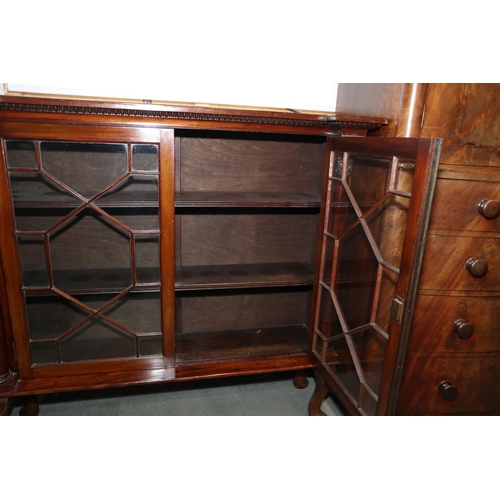 440 - A 19th century mahogany inverse breakfront bookcase enclosed lattice glazed doors with flanking colu... 