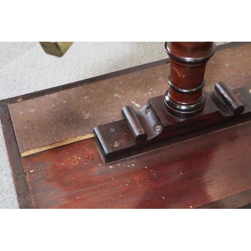 448 - A 19th century walnut and banded low table, on turned column and quadruple splay supports, 24