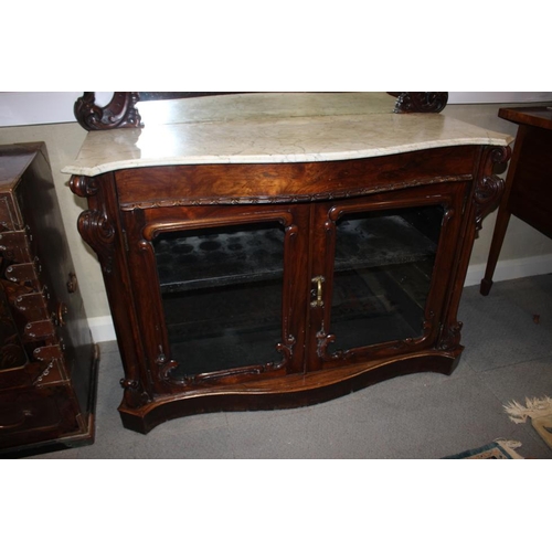 451 - A 19th century carved rosewood serpentine front marble top sideboard, with raised mirror back over f... 