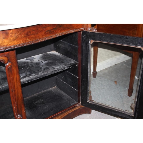 451 - A 19th century carved rosewood serpentine front marble top sideboard, with raised mirror back over f... 