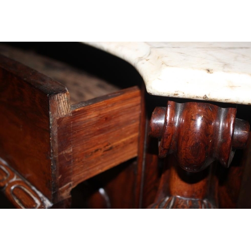 451 - A 19th century carved rosewood serpentine front marble top sideboard, with raised mirror back over f... 