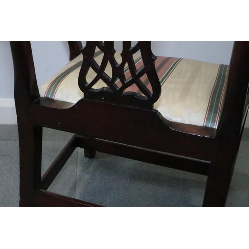 461 - A mahogany carver chair of Chippendale design with Gothic pierced splat and drop-in seat, on chamfer... 