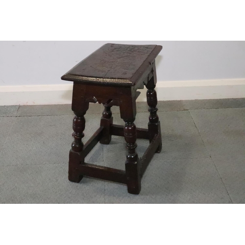 467 - A late 17th century oak joint stool, on turned and stretchered supports, seat underside stamped W P ... 