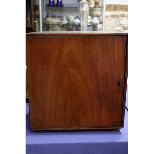 468 - A 19th century mahogany cupboard of drawers with part fitted interior and later drawers, 15