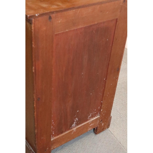 473 - A 19th century French walnut bedside cupboard, fitted one drawer and enclosed one door, with flankin... 