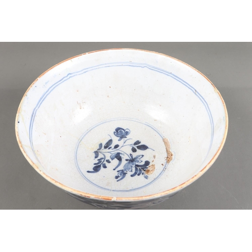 48 - A Bristol delft punch bowl with floral design, 10 3/4