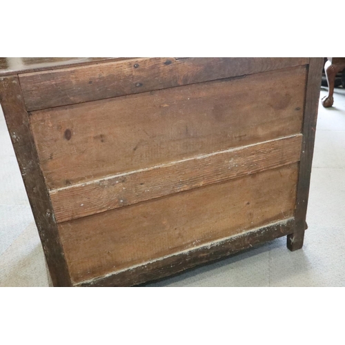 481 - A late 17th century oak chest of three drawers with fielded panel fronts and brass drop handles, 35